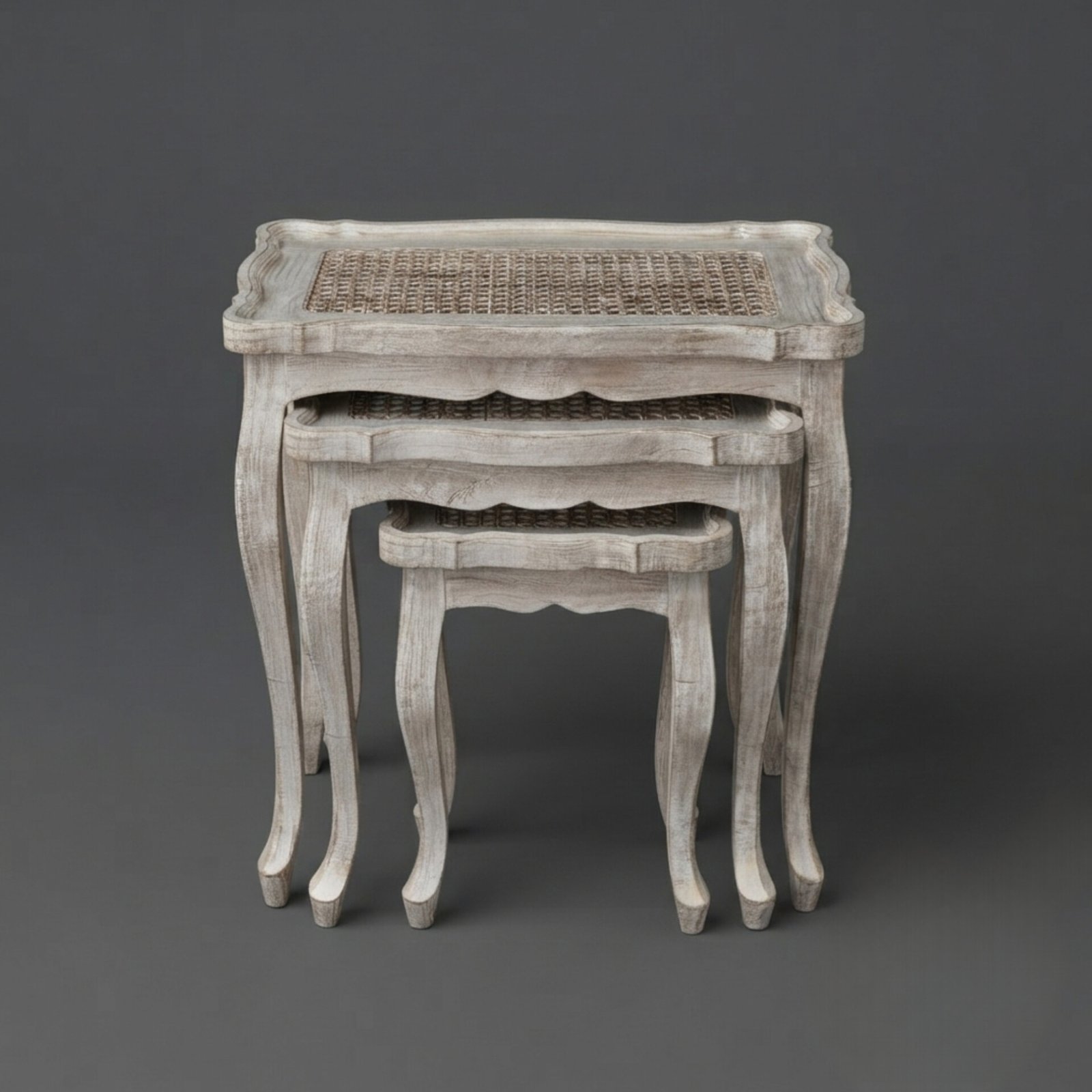 InShot_20260829_111121987 Distressed White Rattan Top Nesting Tables - Image 1
