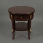 Classic Dark Wood Oval Table with Gilded Accents